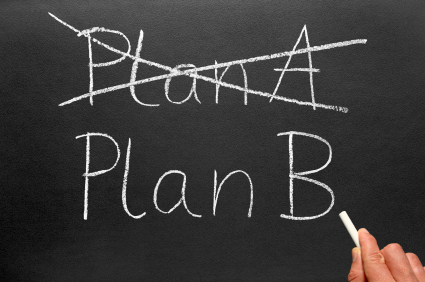 Crossing out Plan A and writing Plan B on a blackboard. cambio